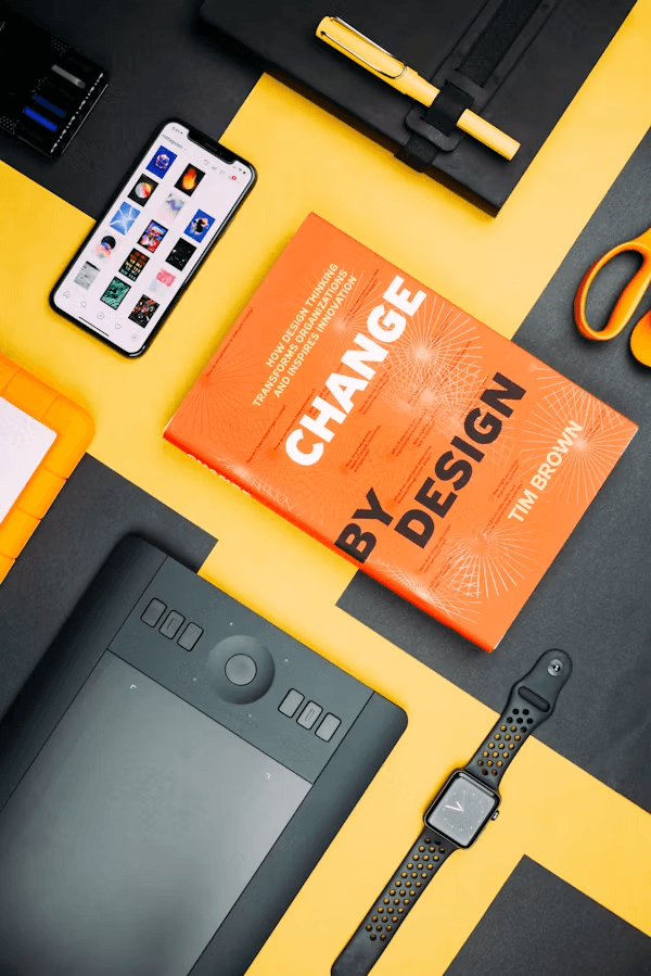 Change by Design book and branding materials